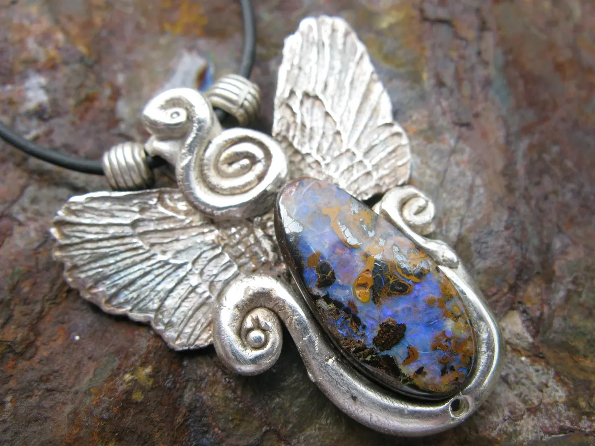 Opal Types Explained: Black, White, Boulder and Crystal Opal Compared